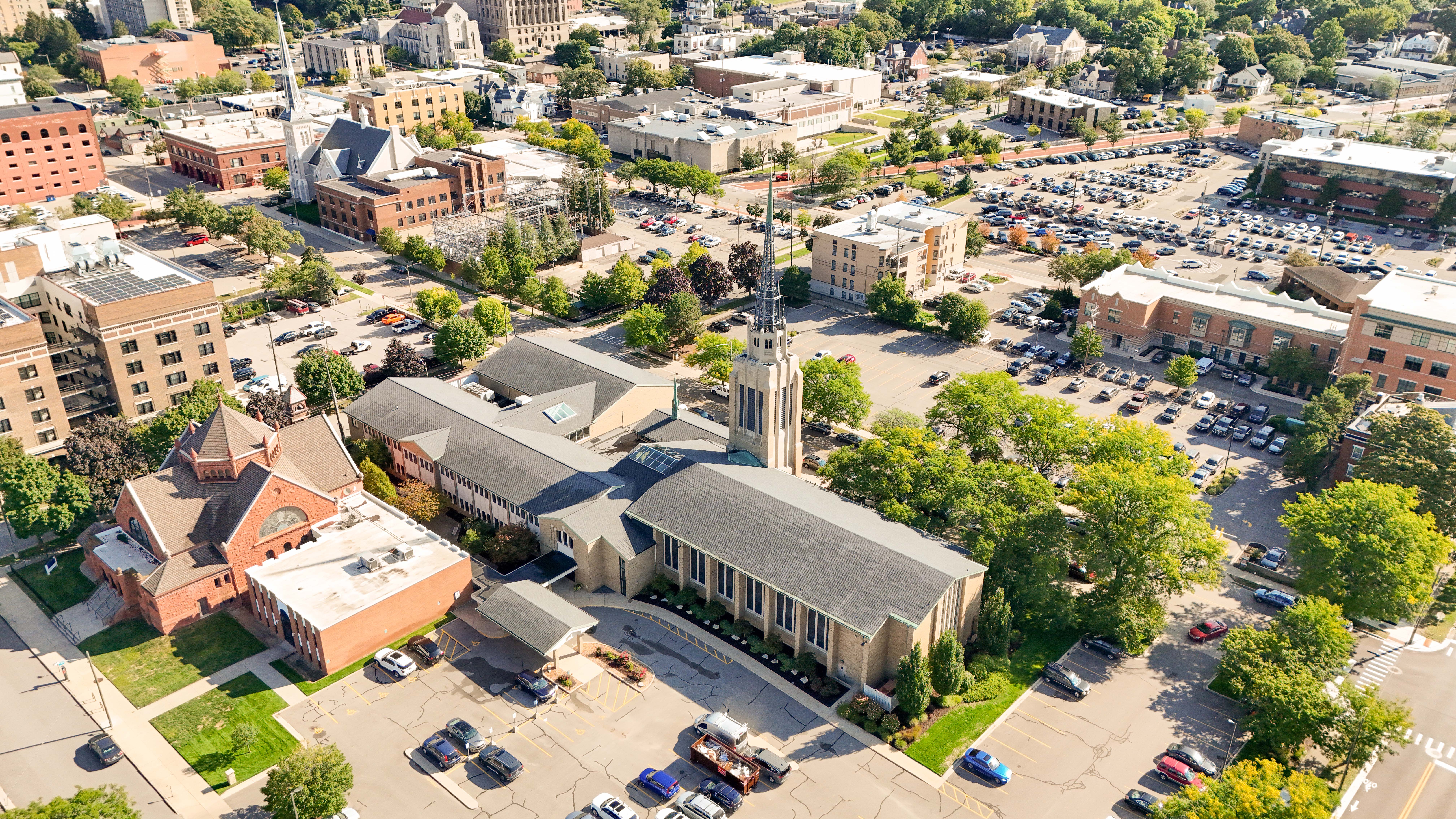 LaGrave Avenue Christian Reformed Church in Grand Rapids, MI, shown from above with church steeple, parking areas, and nearby city streets.