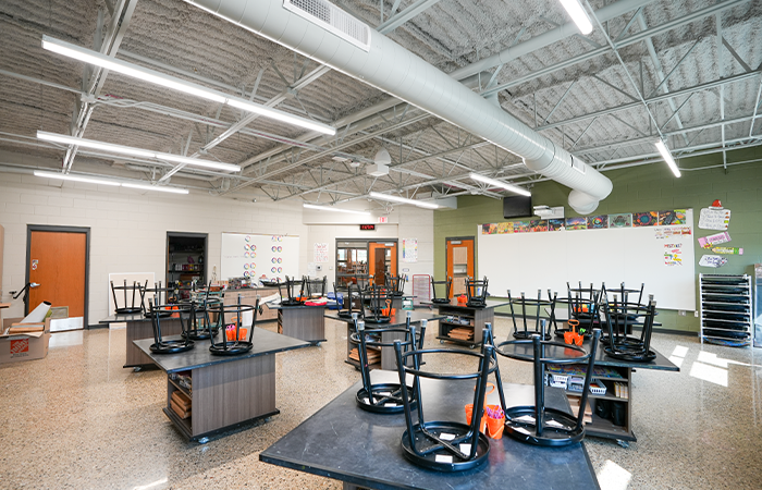 Modern classroom at Moline Christian School with energy-efficient lighting and electrical upgrades installed by Buist.