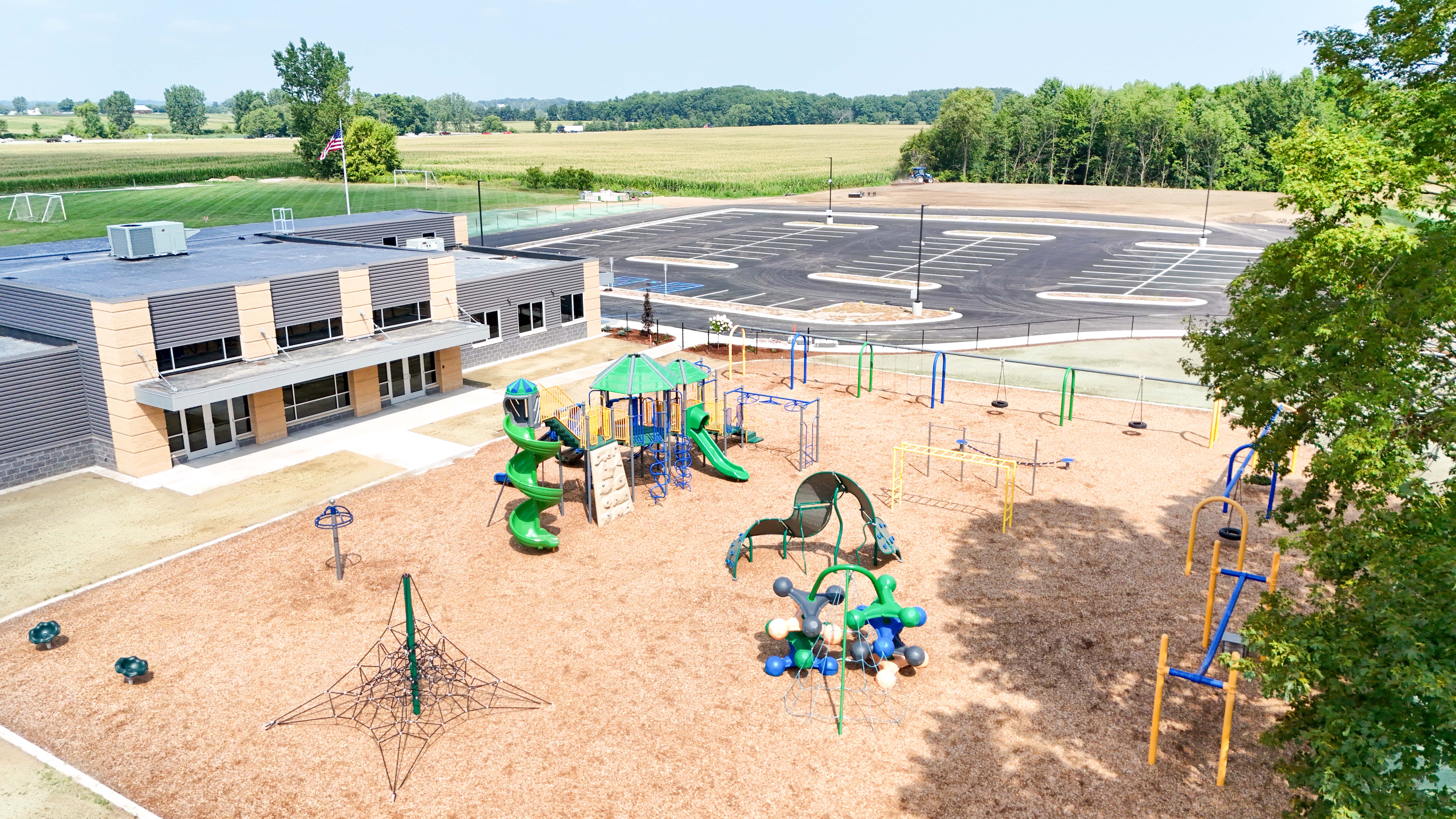 Front exterior of Moline Christian School with playground and parking upgrades completed by Buist.