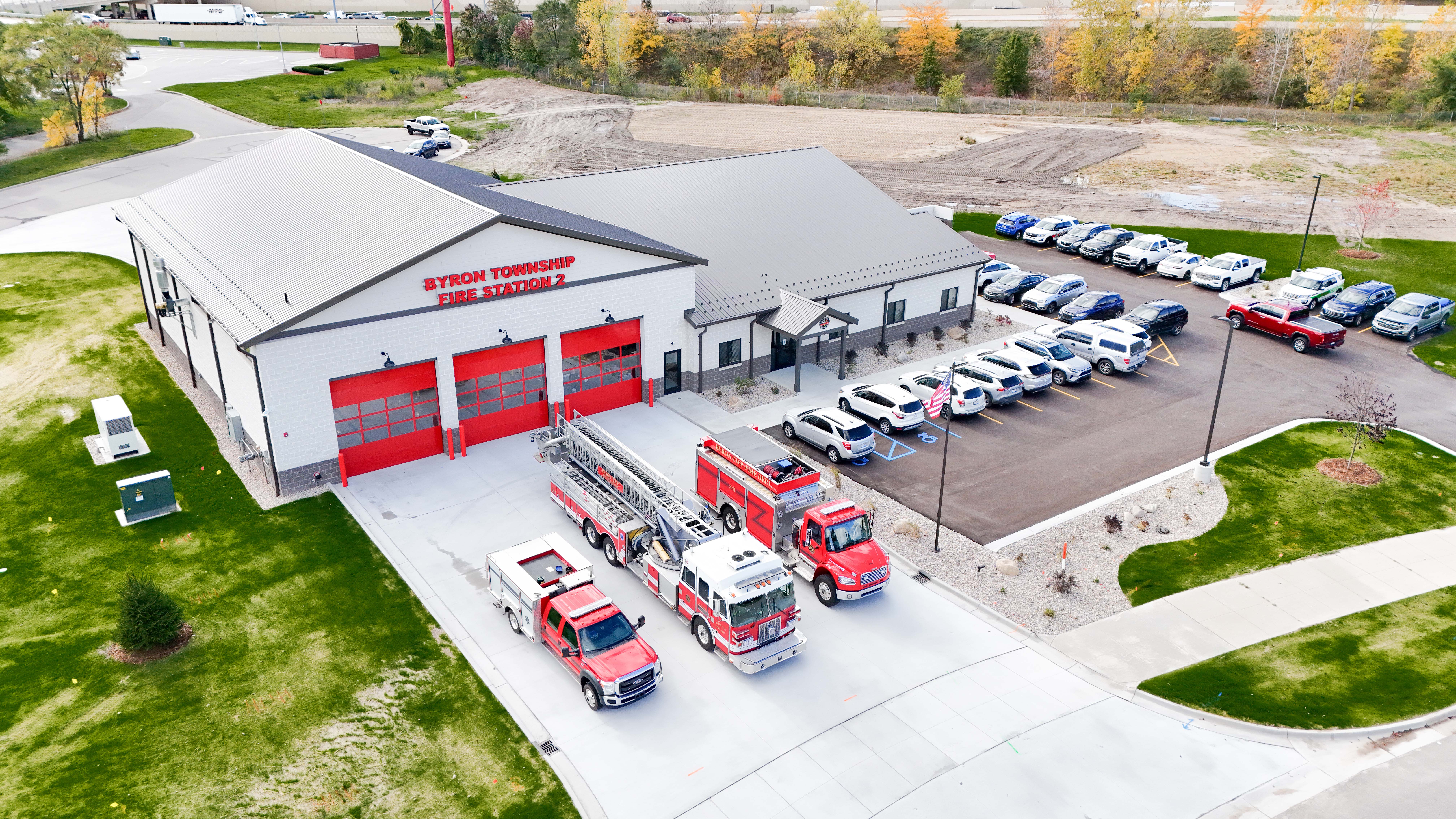 Fire engines parked outside Byron Township Fire Department’s new facility equipped with Buist’s electrical and security systems.
