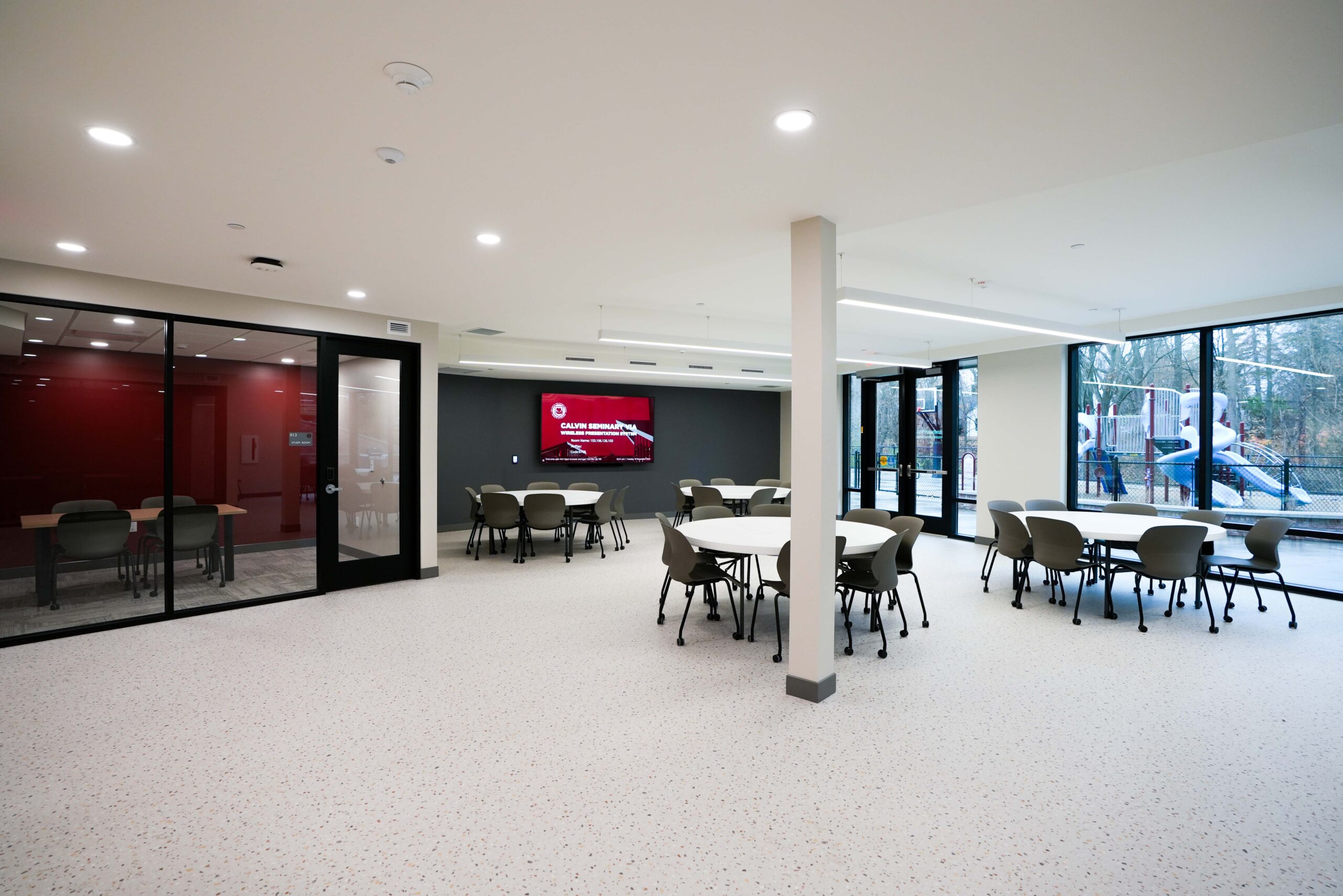 Classroom and gathering space at Calvin Theological Seminary housing with LED lighting installed by Buist.