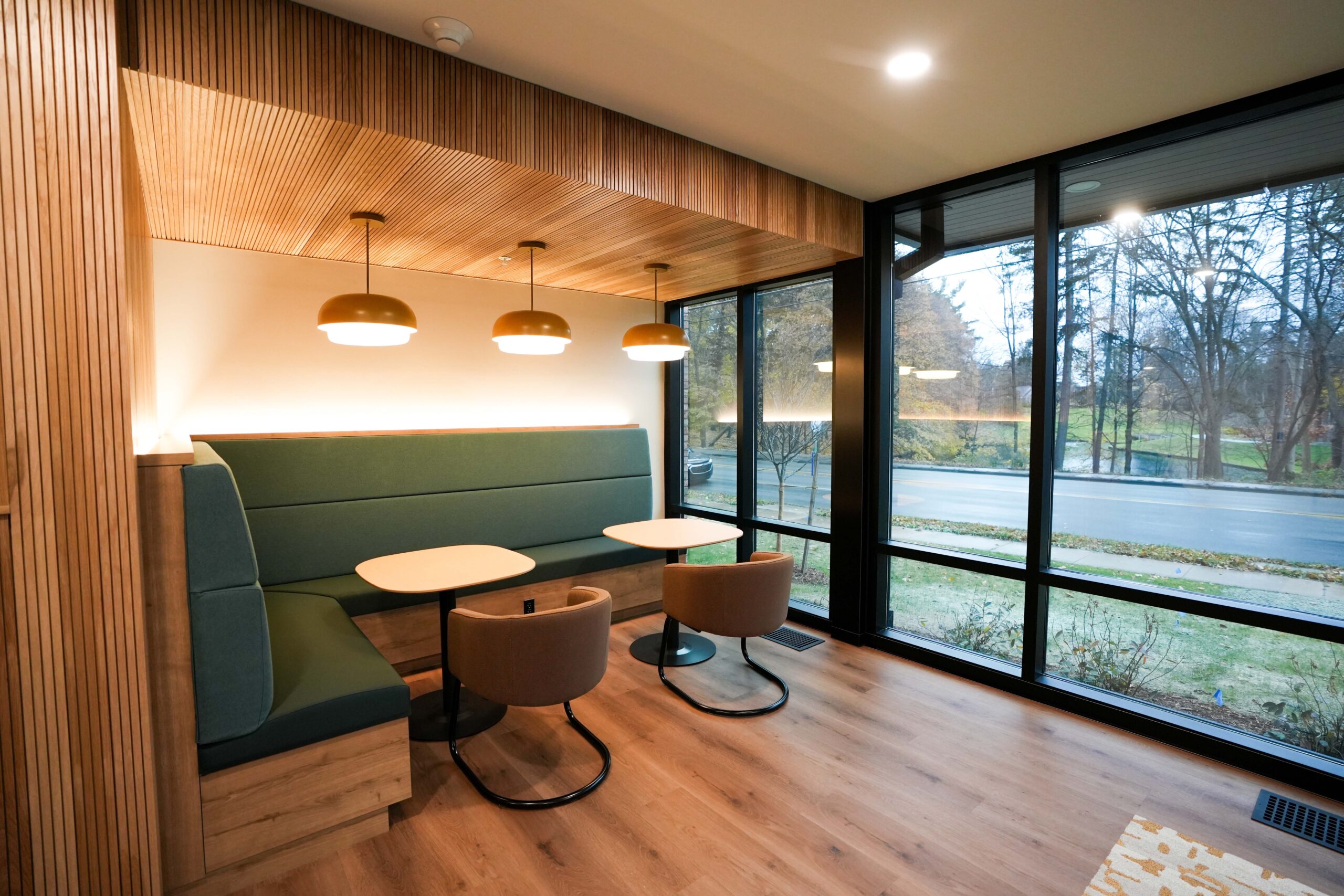 Student lounge at Calvin Theological Seminary housing with modern lighting installed by Buist.