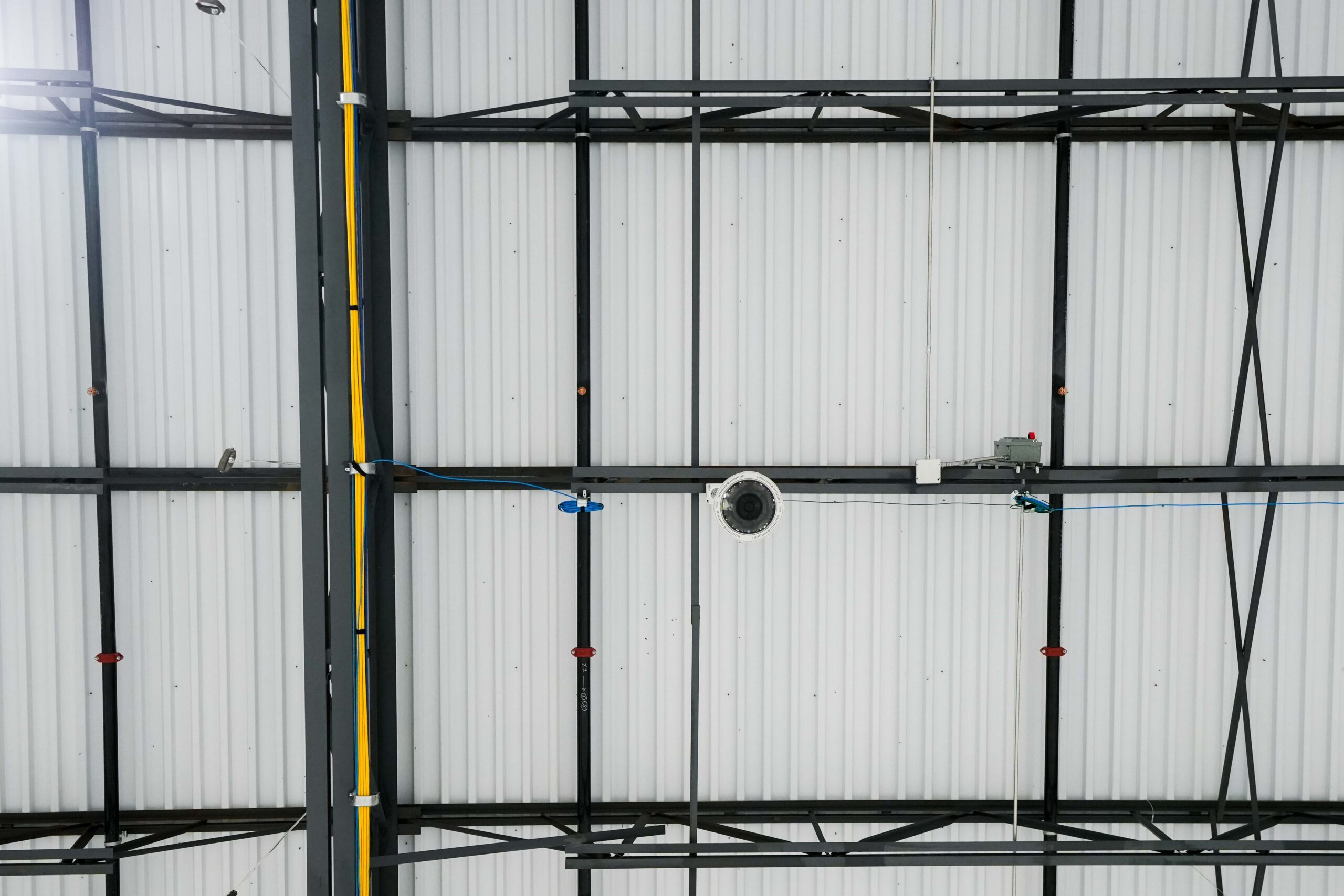 Industrial security camera and communications cabling installed inside Benteler Automotive facility in Grand Rapids Michigan