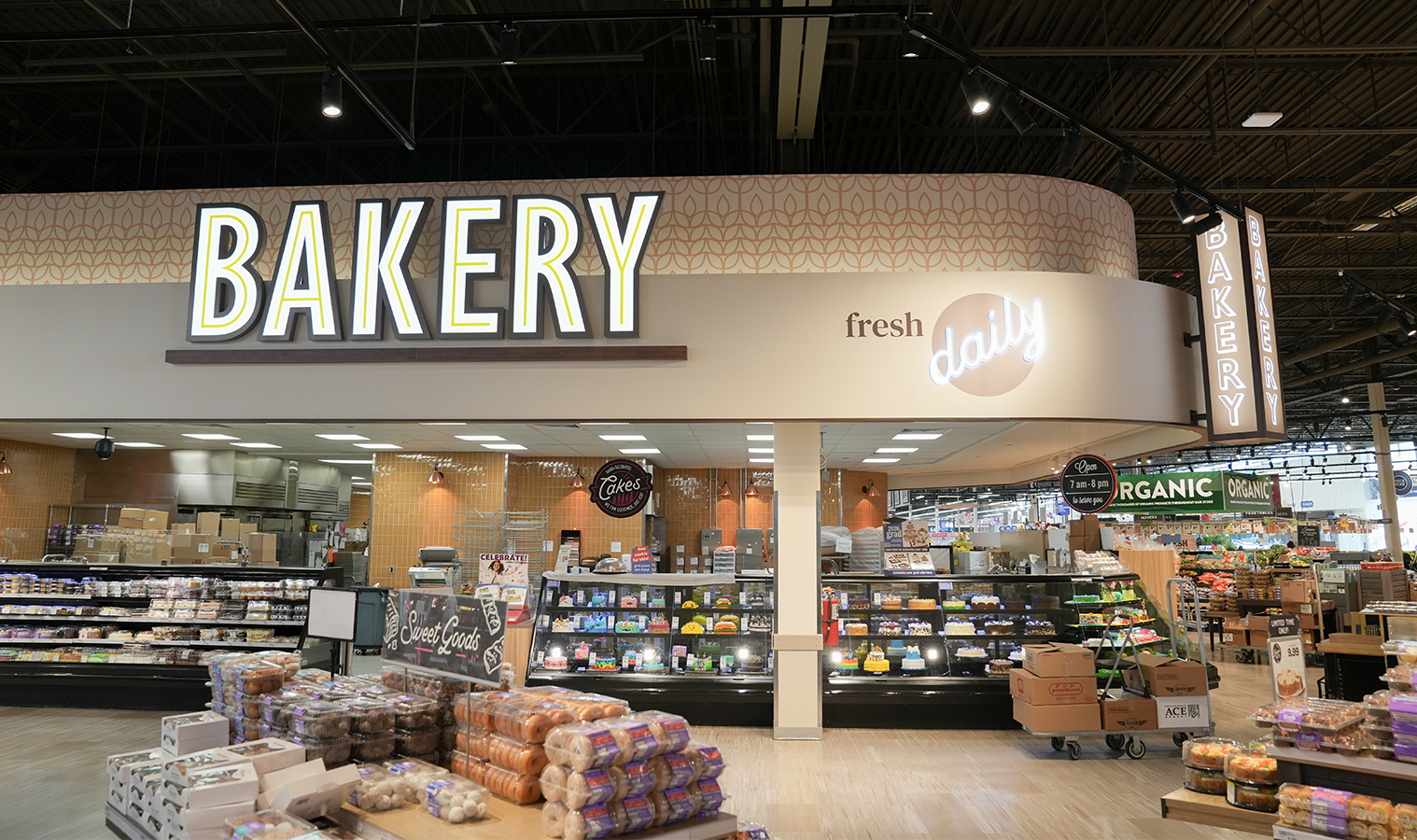 Bakery department at Meijer Knapp's Corner featuring modern lighting and illuminated signage.