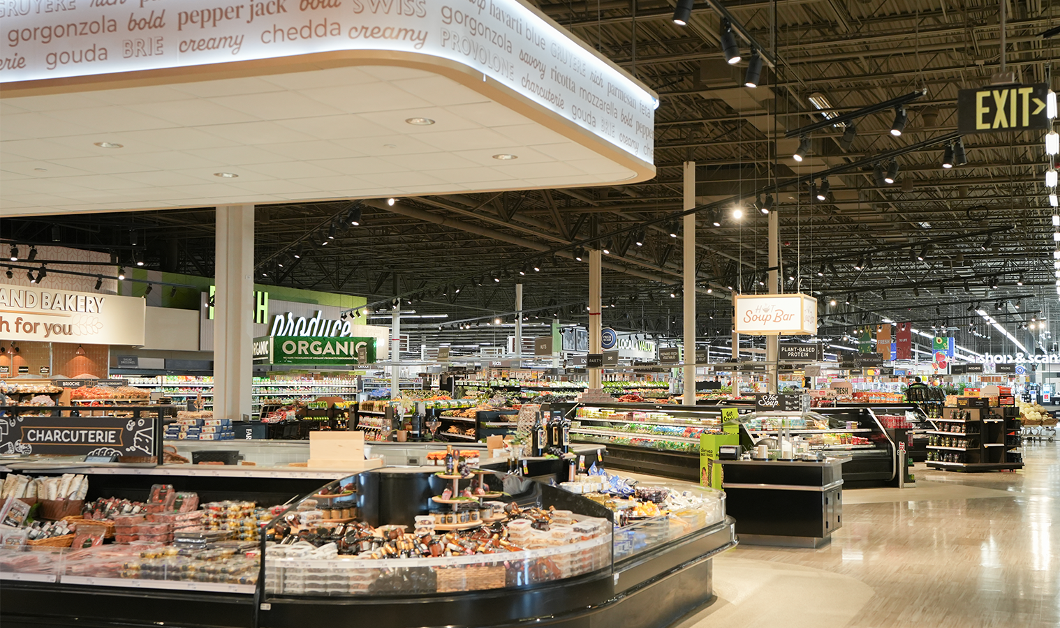 Specialty grocery department featuring custom lighting and updated electrical systems.