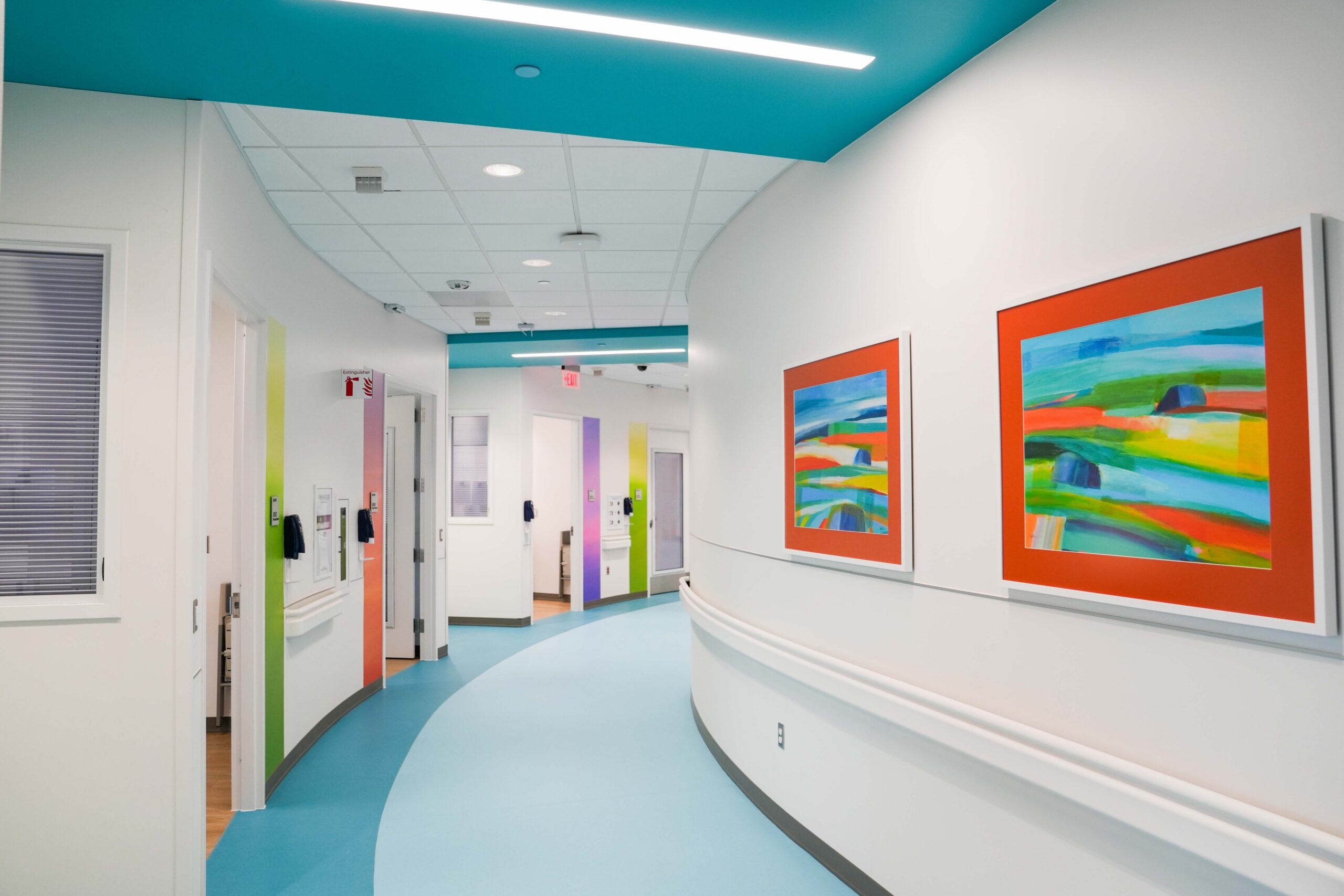 Curved patient room corridor on the renovated 10th floor of Helen DeVos Children’s Hospital.