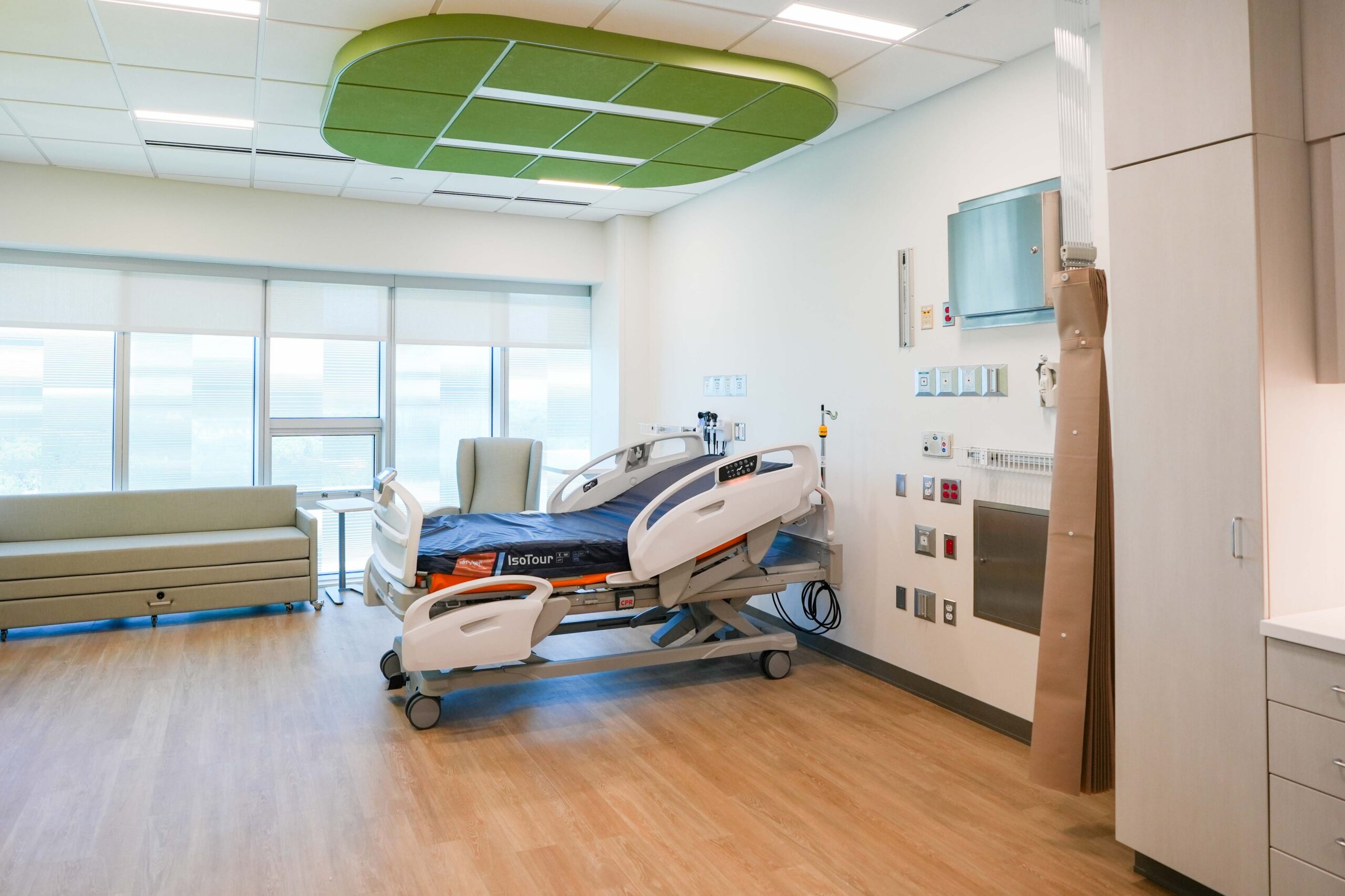 Pediatric patient room with bedside electrical infrastructure at Helen DeVos Children’s Hospital.